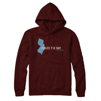 A maroon hoodie. The hoodie has the text "SAVES THE DAY" printed in pink on the center. There is small light blue text that says "New Jersey" under the band name. Next to the band name is the outline of the state of New Jersey. The  outline is filled in using light blue. There is also a small pink star marked on the location of where the band is from.