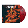 A red marbled hardcore vinyl record partially slides from its cover, which displays a four-armed Hindu goddess seated cross-legged, with "Shelter" as the band name above and the album title "Mantra" below her.