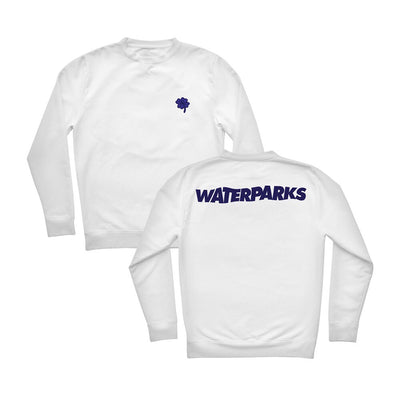 White crewneck with a clover drawn on the top front corner. On the back, there is large text that spells WATERPARKS across the back of shoulders area.