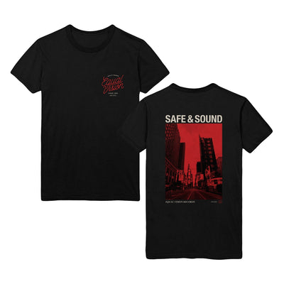 Black t shirt against white background. Front of t shirt has "EQUAL VISION" printed in red cursive in upper right corner. Above has "QUALITY RECORDS" printed in white and below has "SINCE 1990" printed in white. Back of t shirt has a red and black picture of a city with "SAFE AND SOUND" printed above the picture in the center.