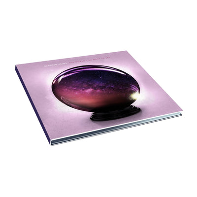 Purple square CD with white font that says GLACIER VEINS. Next to that there is more font that says THE WORLD YOU WANT TO SEE in white. Below that there is a purple crystal ball.