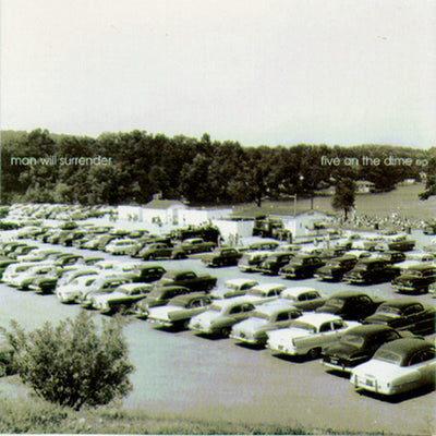 Record with a picture of cars parked in a parking lot and land and trees in the background. Picture is in black and white. In the trees is printed "MAN WILL SURRENDER" on the left side and "FIVE ON THE DIME EP" on the right side.