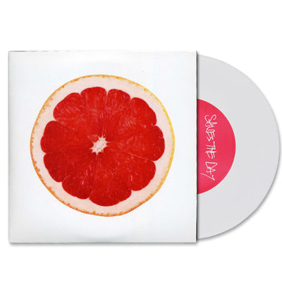 White Vinyl jacket with an image of the interior of a grapefruit. Peeking out of the sleeve is a white vinyl disc with "SAVES THE DAY" written in the center. 