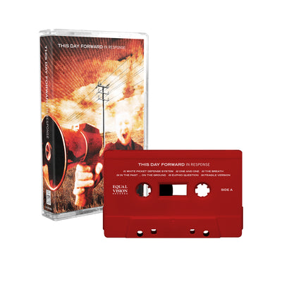 This Day Forward - 'In Response' cassette tape. The picture depicts the cassette against a white background. On the album cover is a man in a field, holding a megaphone. Above him is an orange, black, and white sky. The tape beside the album cover is red.