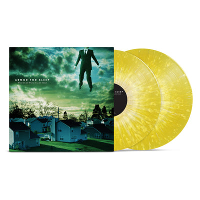 Yellow Vinyl with white splatter. The art on the jacket is a photo of a suburb with a green tinted sky. There is a man in a suit floating in the air. The mans face is unable to be seen, as it is cut out of the photo. The text "ARMOR FOR SLEEP" "WHAT TO DO WHEN YOU ARE DEAD" is printed on the left side of the artwork in small lettering