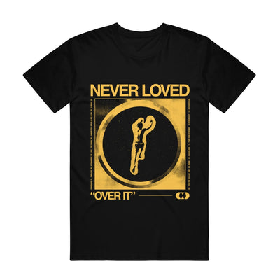 Black short sleeve shirt with yellow text that says NEVER LOVED across the chest. Below that there is a yellow drawing of the outline of a boy jumping. Below the drawing there is more yellow text that says OVER IT.