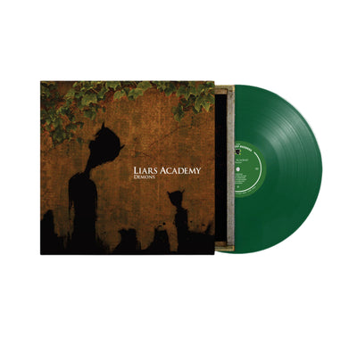 The cover of this album has a brown background with green leaves extending across the top of the cover.  in the middle of the cover are various shadows with different sizes.  Both shadows have small horns growing out of their heads.  On the right side of the album cover reads LIARS ACADEMY in white letters with the word DEMONS written below it in smaller letters.  The vinyl itself is dark green with a lighter green center.