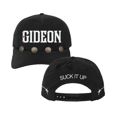 black hat that has texts on the front that reads Gideon and text on the back that reads SUCK IT UP.  There is barbed wire going around the sides of the hat to the back.